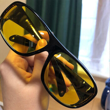 Laura H. wearing prescription frames with PolorVision fit-over glasses